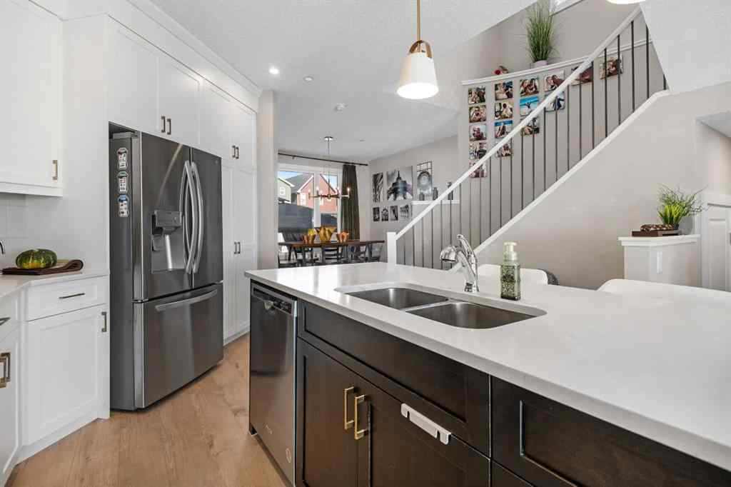 MLS® A2259703 - 44 Calhoun Common NE in Livingston Calgary, Residential