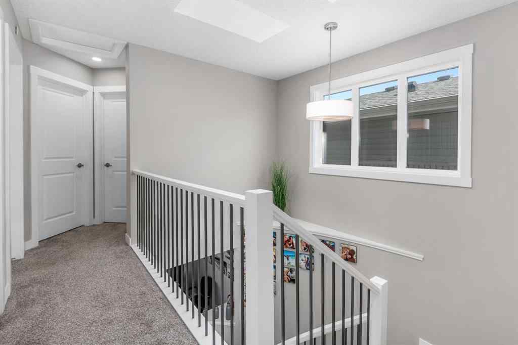 MLS® A2259703 - 44 Calhoun Common NE in Livingston Calgary, Residential