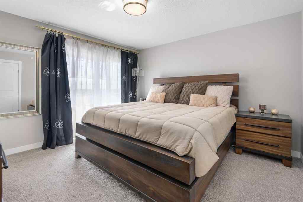 MLS® A2259703 - 44 Calhoun Common NE in Livingston Calgary, Residential