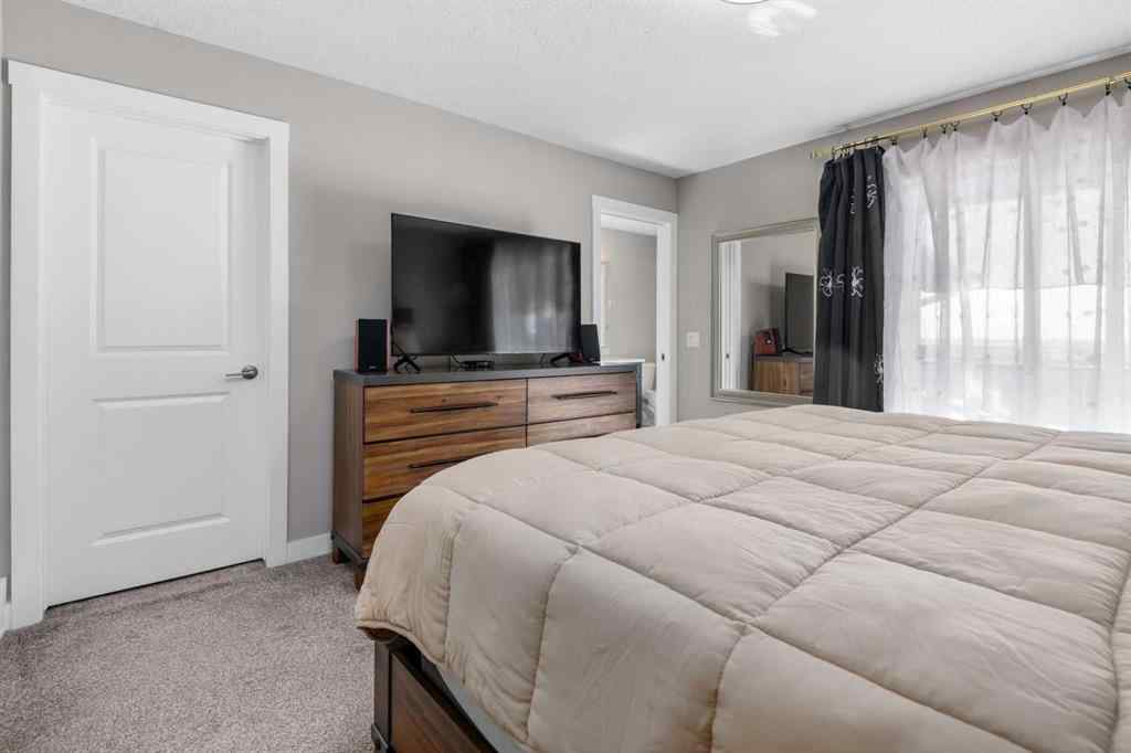 MLS® A2259703 - 44 Calhoun Common NE in Livingston Calgary, Residential