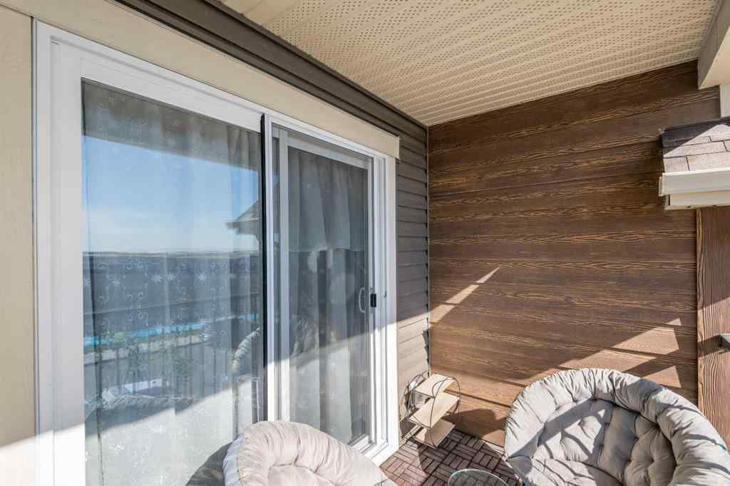 MLS® A2259703 - 44 Calhoun Common NE in Livingston Calgary, Residential