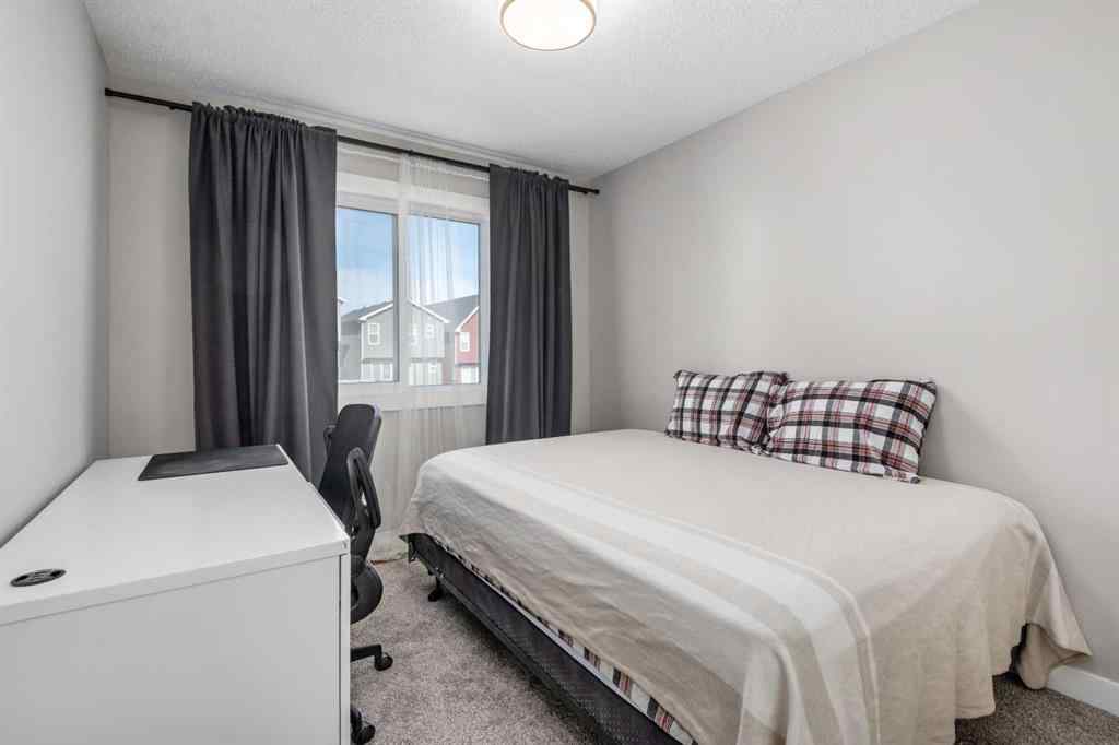 MLS® A2259703 - 44 Calhoun Common NE in Livingston Calgary, Residential