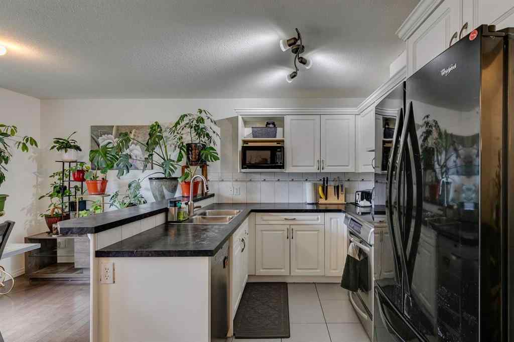 MLS® A2259710 - 51 Spring Meadows Bay  in Cimarron Meadows Okotoks, Residential