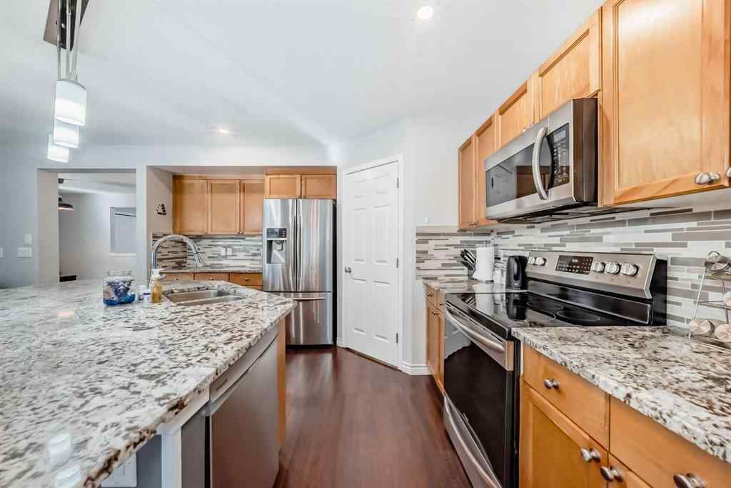 MLS&reg; # A2259732 - 574 Chaparral Drive SE in Chaparral Calgary, Residential Open Houses