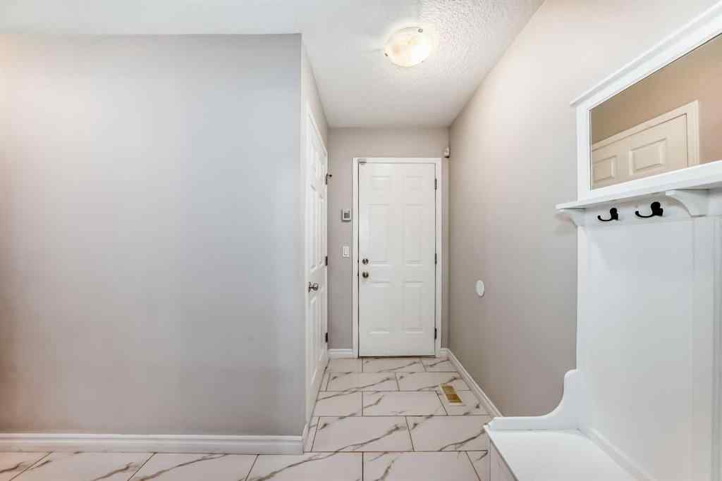 MLS&reg; # A2259732 - 574 Chaparral Drive SE in Chaparral Calgary, Residential Open Houses
