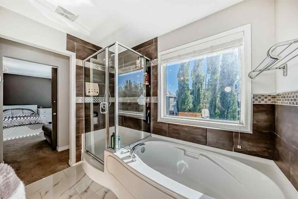 MLS&reg; # A2259732 - 574 Chaparral Drive SE in Chaparral Calgary, Residential Open Houses