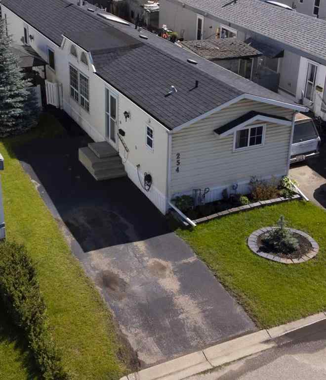 MLS® A2259734 - 254 Erin Woods Circle SE in Erin Woods Calgary, Residential