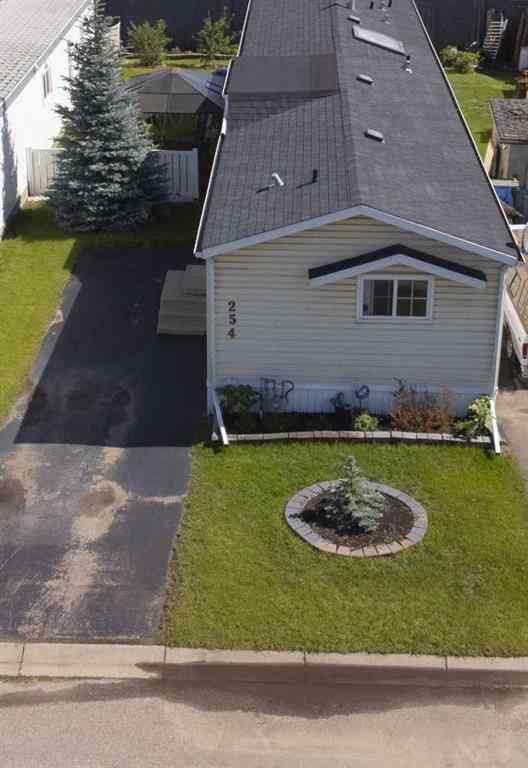 MLS® A2259734 - 254 Erin Woods Circle SE in Erin Woods Calgary, Residential