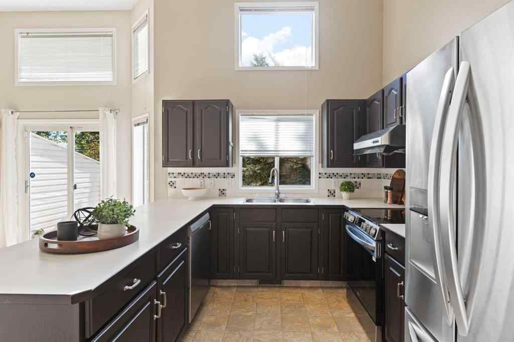 MLS® A2259737 - 51 Kingsland Villas SW in Kingsland Calgary, Residential