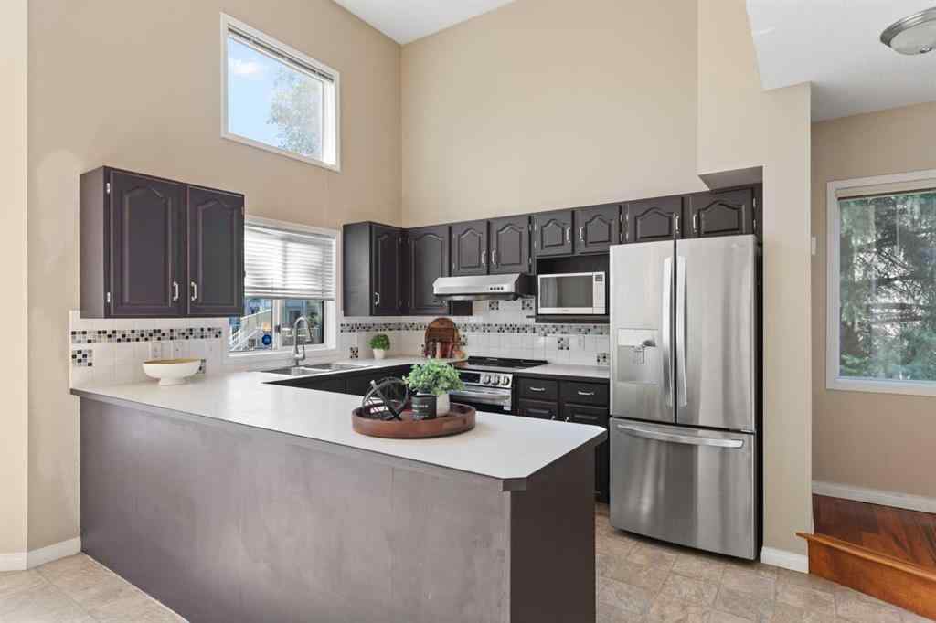 MLS® A2259737 - 51 Kingsland Villas SW in Kingsland Calgary, Residential