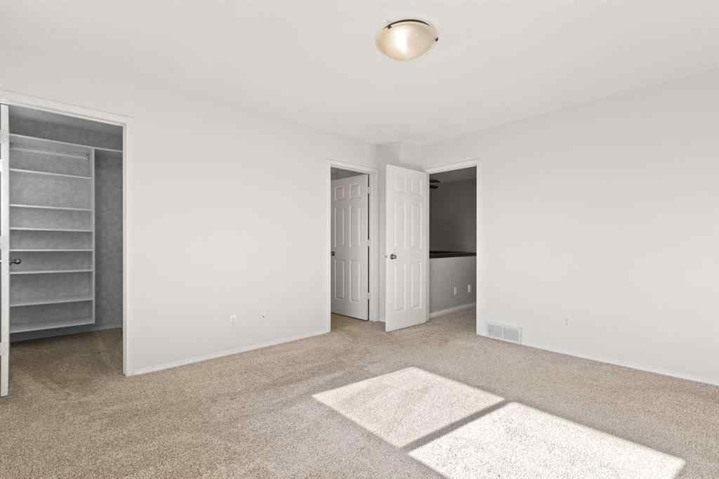 MLS® A2259737 - 51 Kingsland Villas SW in Kingsland Calgary, Residential