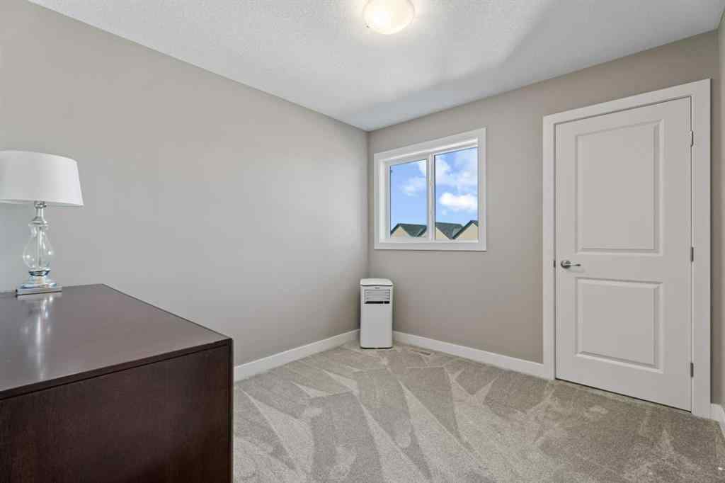 MLS® A2259756 - 332 Lawthorn Way SE in Lanark Airdrie, Residential