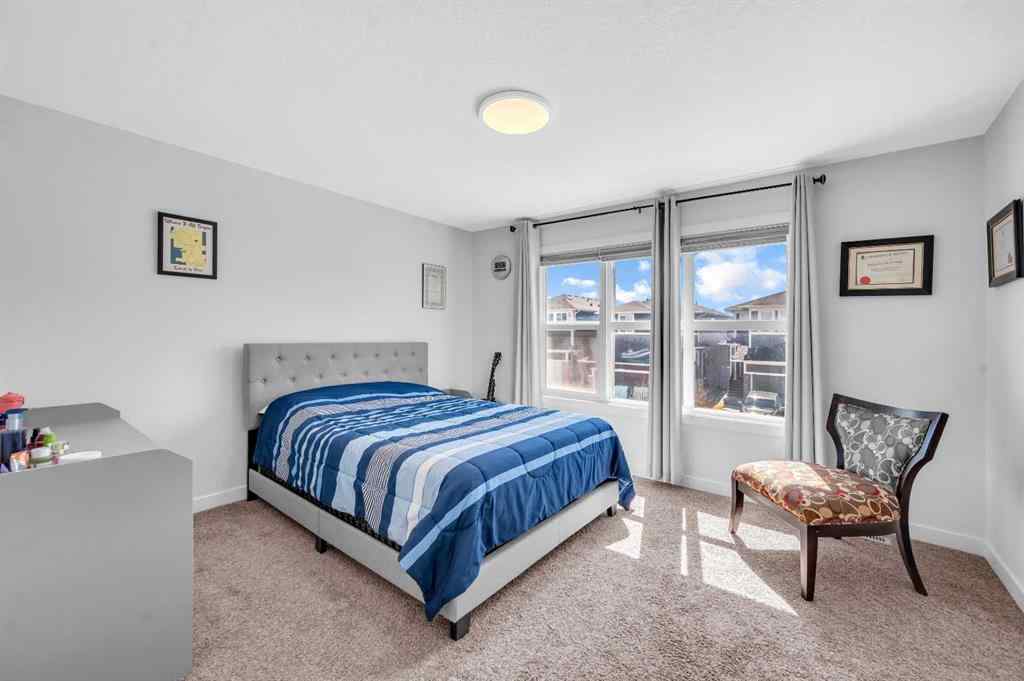 MLS® A2259776 - 127 Ambleside Crescent NW in Moraine Calgary, Residential