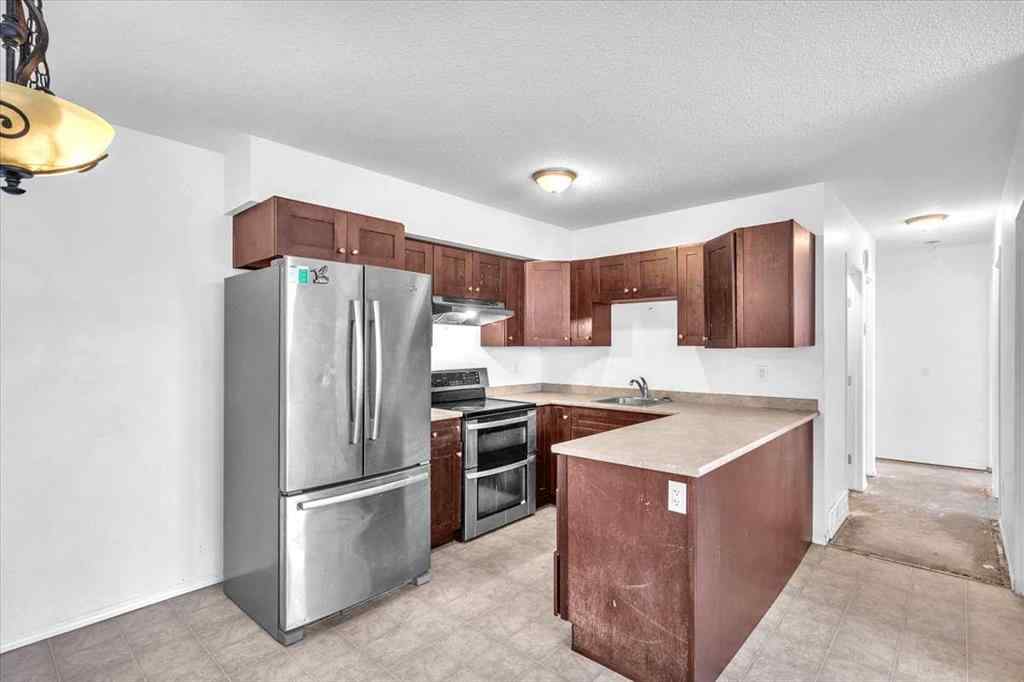 MLS® A2259789 - Unit #103 605 19 Street SE in Sunshine Meadow High River, Residential