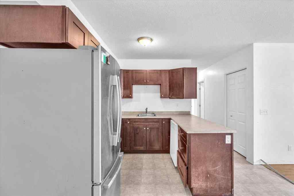 MLS® A2259789 - Unit #103 605 19 Street SE in Sunshine Meadow High River, Residential