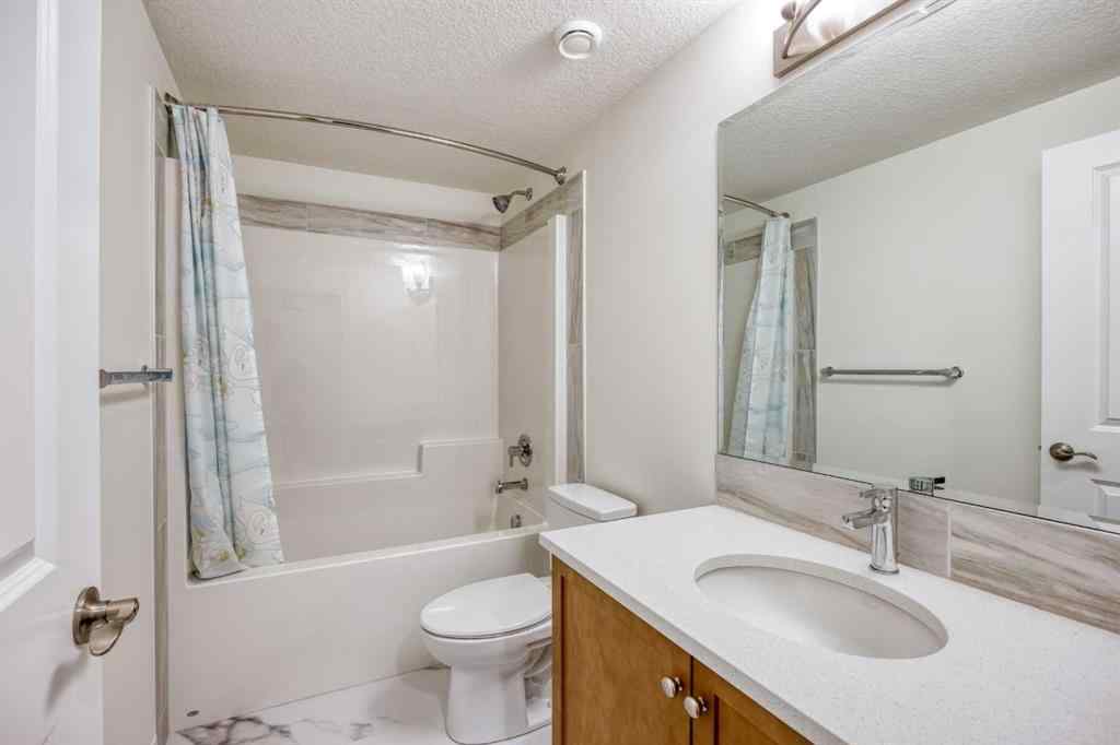 MLS® A2259818 - 244 Lucas Way NW in Livingston Calgary, Residential