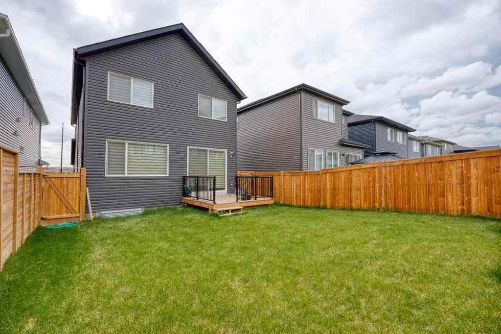 MLS® A2259818 - 244 Lucas Way NW in Livingston Calgary, Residential