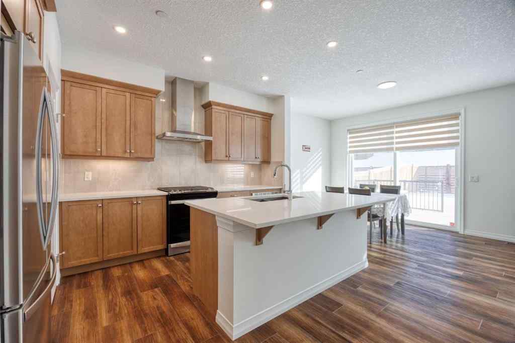 MLS® A2259818 - 244 Lucas Way NW in Livingston Calgary, Residential