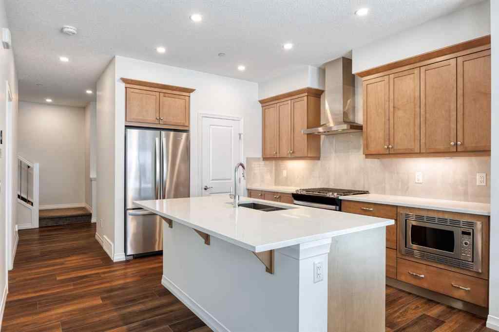 MLS® A2259818 - 244 Lucas Way NW in Livingston Calgary, Residential