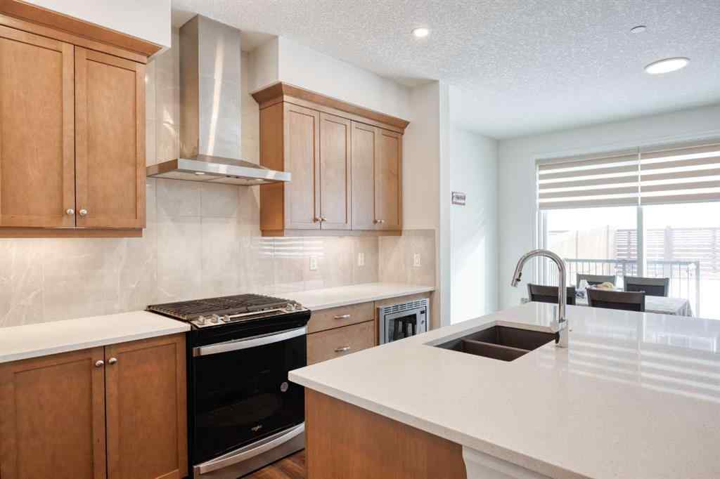 MLS® A2259818 - 244 Lucas Way NW in Livingston Calgary, Residential