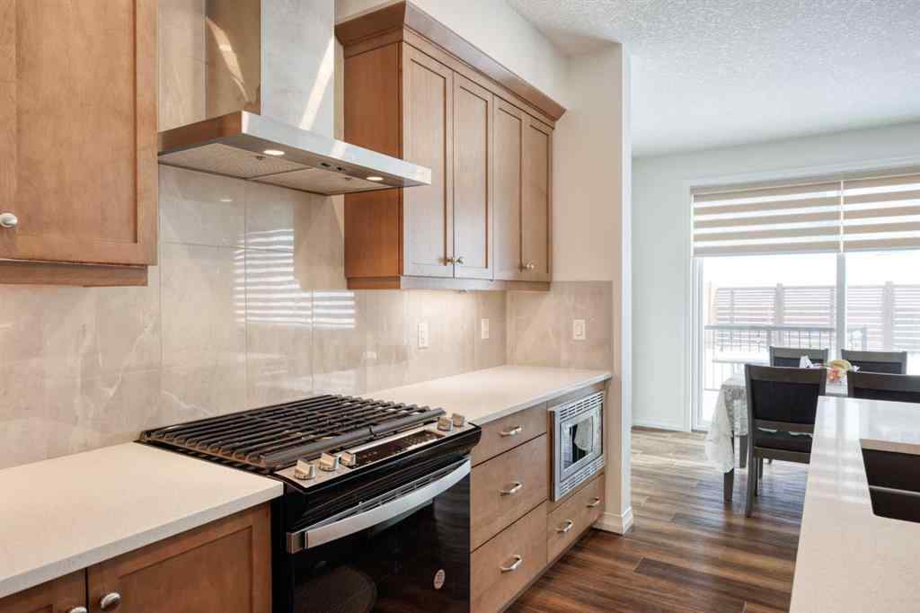 MLS® A2259818 - 244 Lucas Way NW in Livingston Calgary, Residential