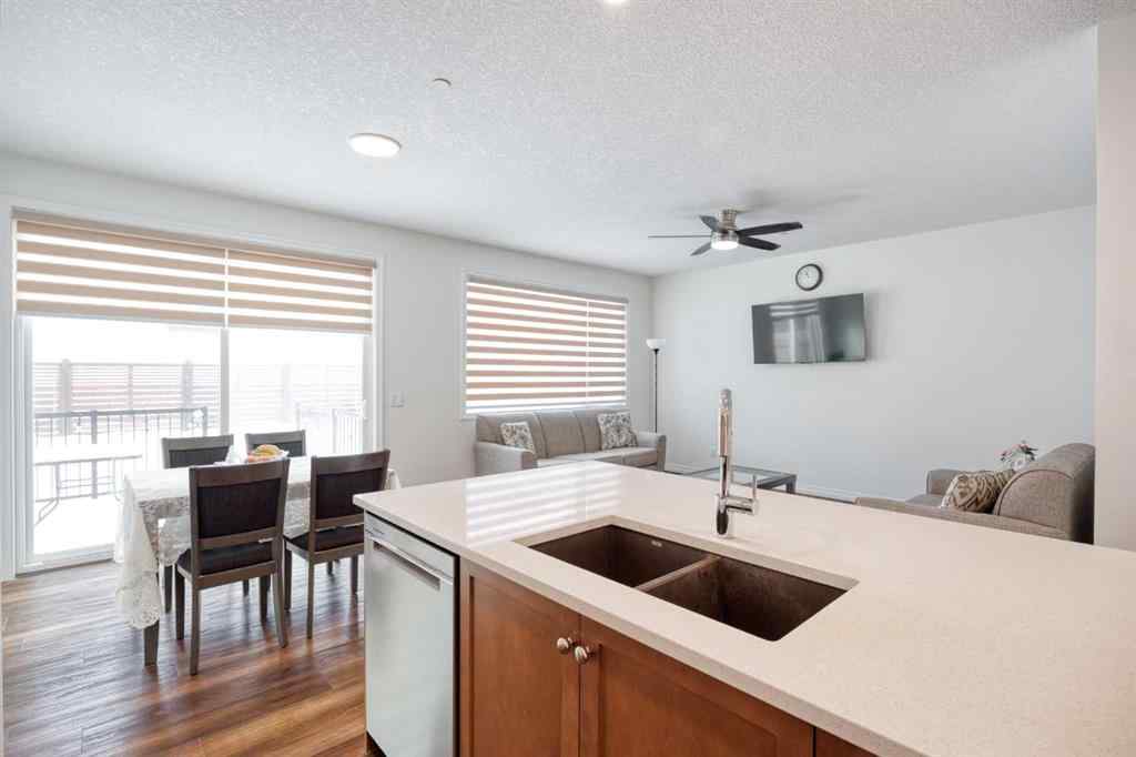 MLS® A2259818 - 244 Lucas Way NW in Livingston Calgary, Residential