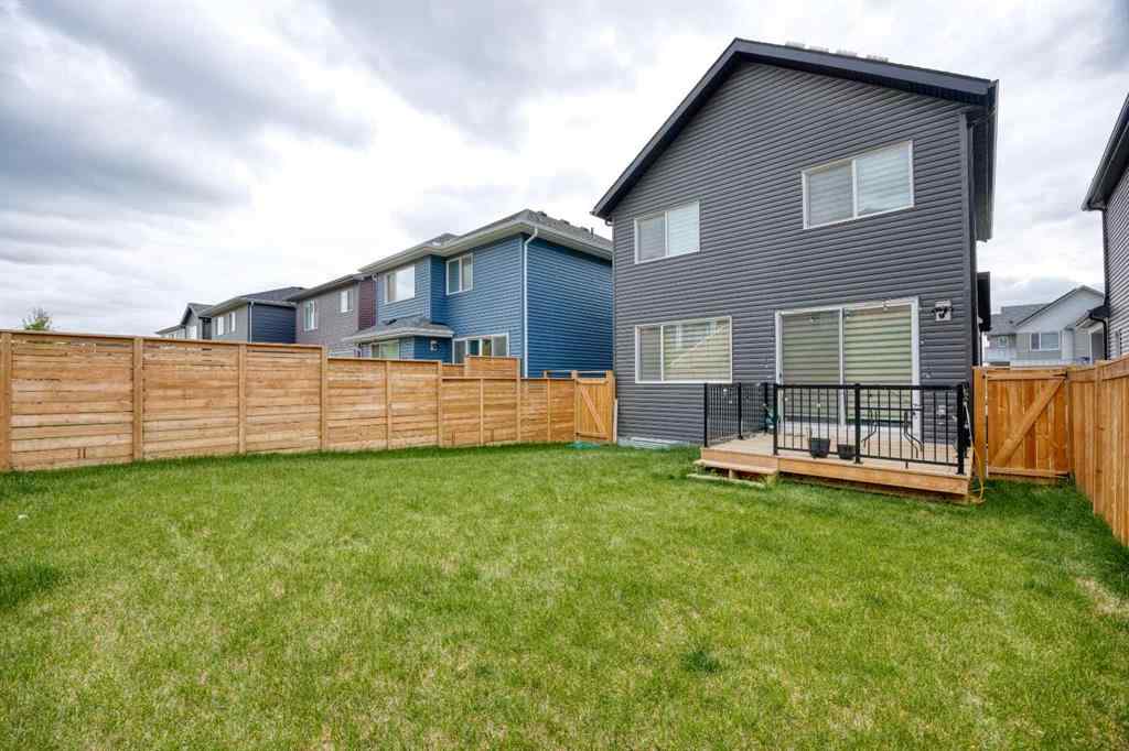 MLS® A2259818 - 244 Lucas Way NW in Livingston Calgary, Residential