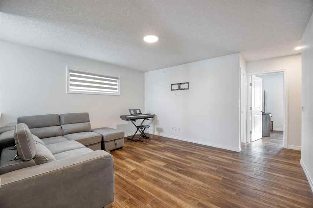 MLS® A2259818 - 244 Lucas Way NW in Livingston Calgary, Residential