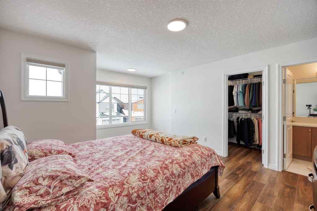 MLS® A2259818 - 244 Lucas Way NW in Livingston Calgary, Residential