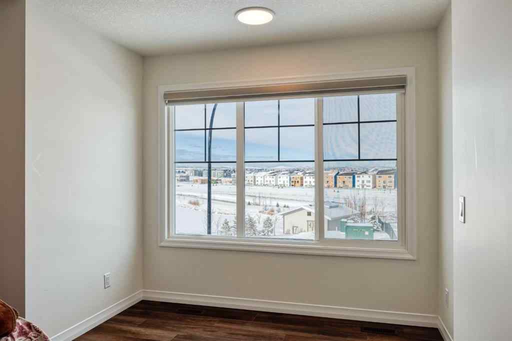 MLS® A2259818 - 244 Lucas Way NW in Livingston Calgary, Residential