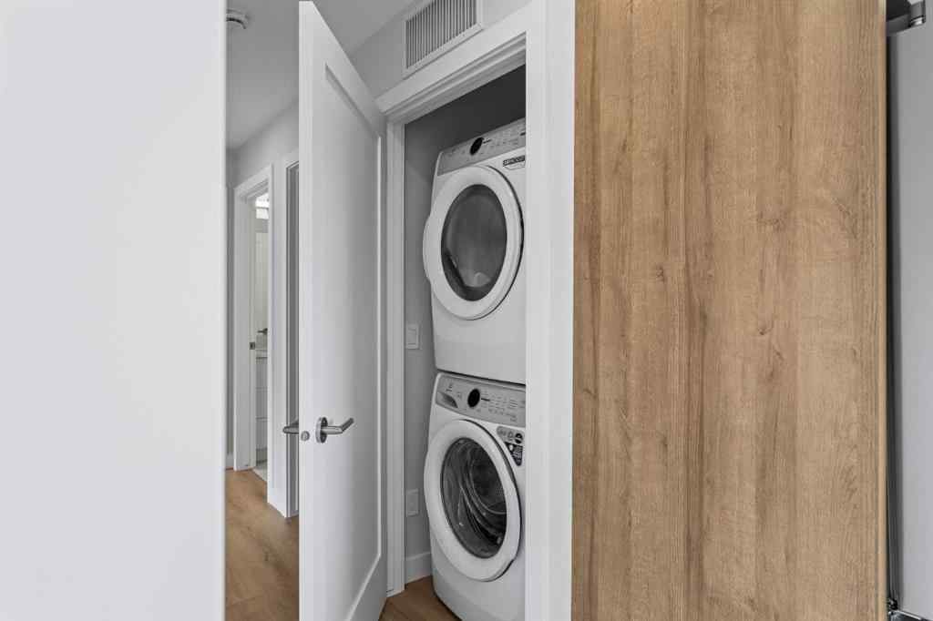 MLS® A2259828 - Unit #203J 209 Stewart Creek Rise  in Three Sisters Canmore, Residential