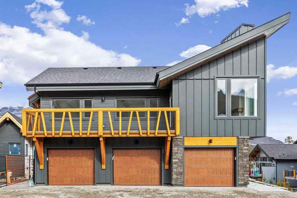 MLS® A2259828 - Unit #203J 209 Stewart Creek Rise  in Three Sisters Canmore, Residential