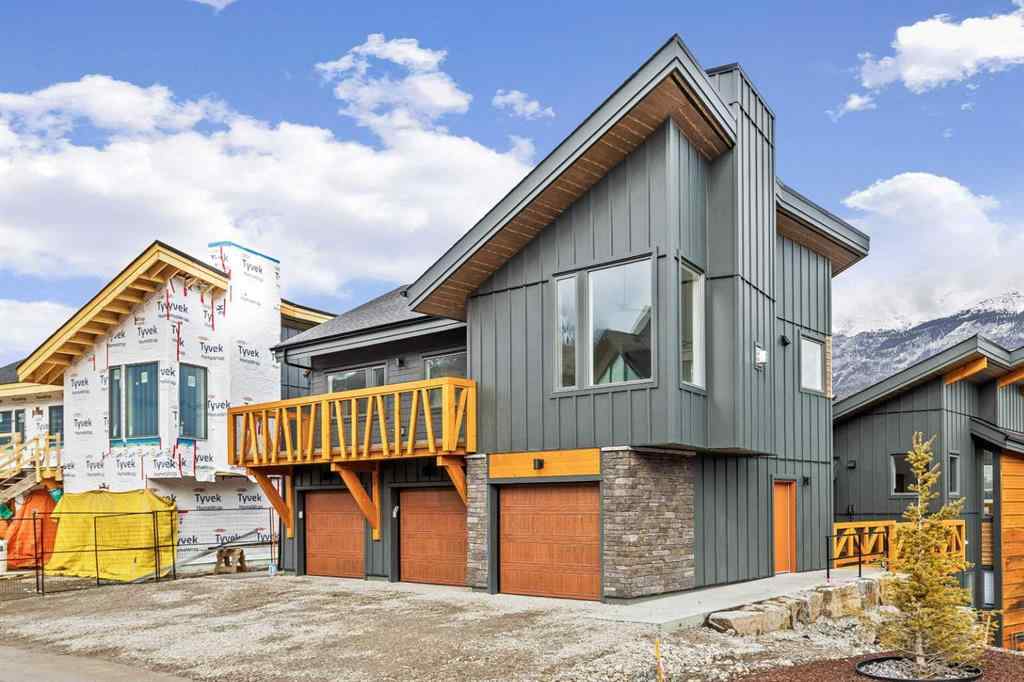 MLS® A2259828 - Unit #203J 209 Stewart Creek Rise  in Three Sisters Canmore, Residential