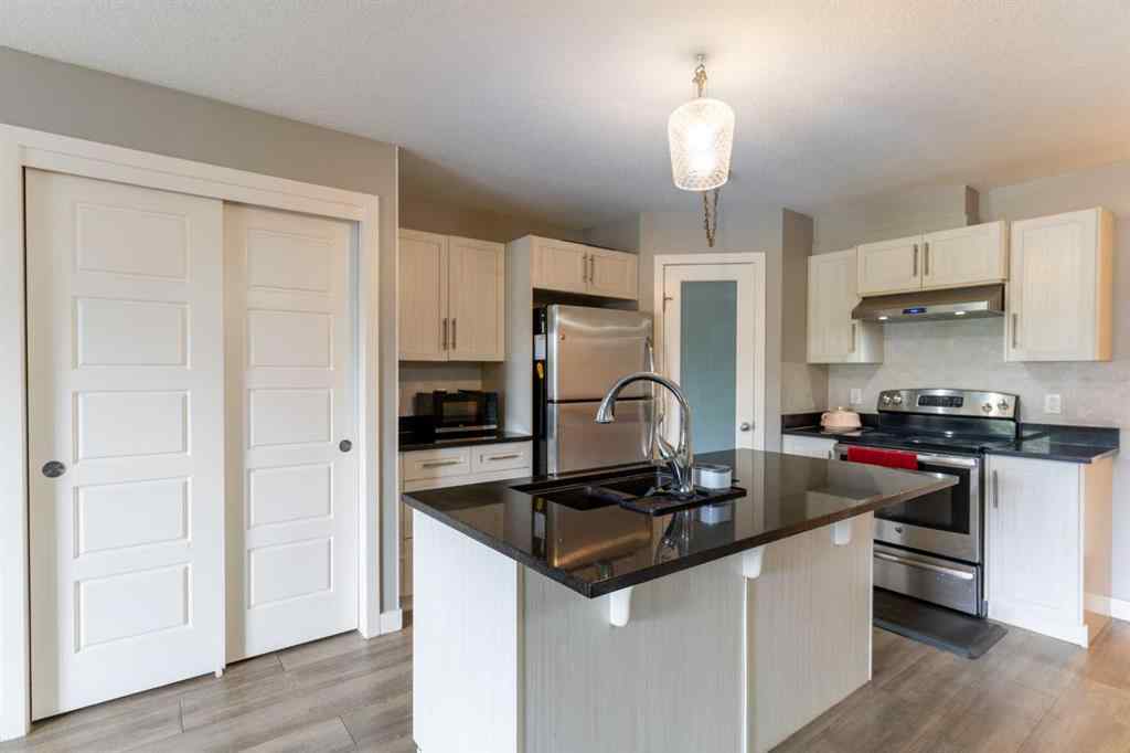 MLS® A2259840 - Unit #4103 2781 chinook winds Drive SW in Prairie Springs Airdrie, Residential