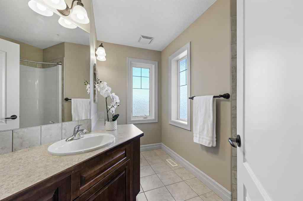 MLS® A2259842 - 147 Coopers Hill SW in Coopers Crossing Airdrie, Residential