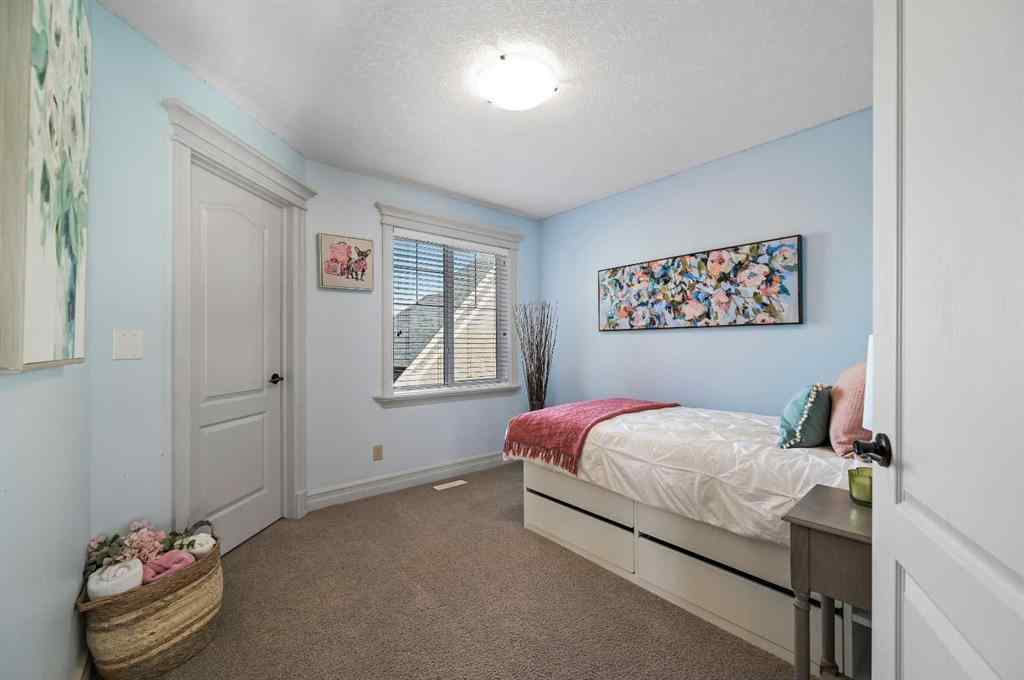 MLS® A2259842 - 147 Coopers Hill SW in Coopers Crossing Airdrie, Residential