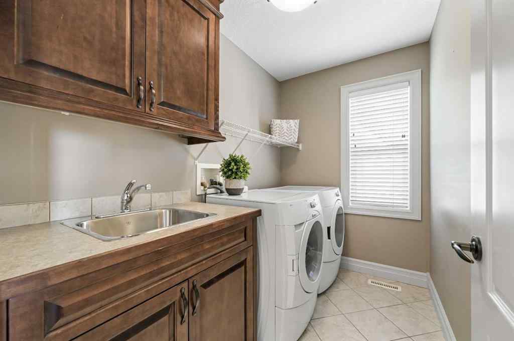 MLS® A2259842 - 147 Coopers Hill SW in Coopers Crossing Airdrie, Residential