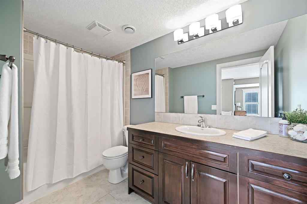 MLS® A2259842 - 147 Coopers Hill SW in Coopers Crossing Airdrie, Residential