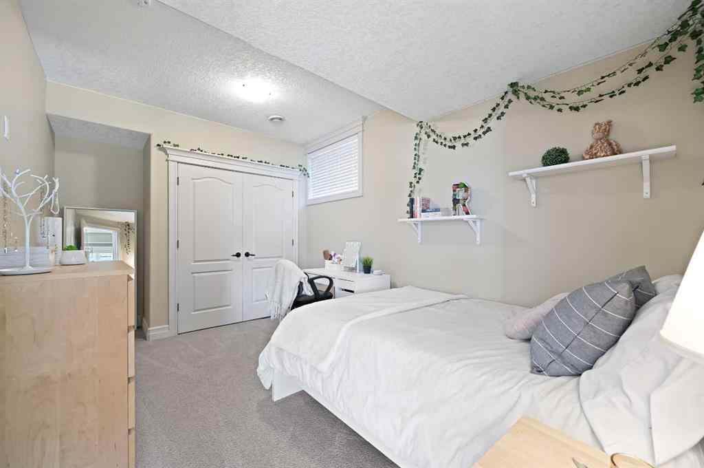 MLS® A2259842 - 147 Coopers Hill SW in Coopers Crossing Airdrie, Residential