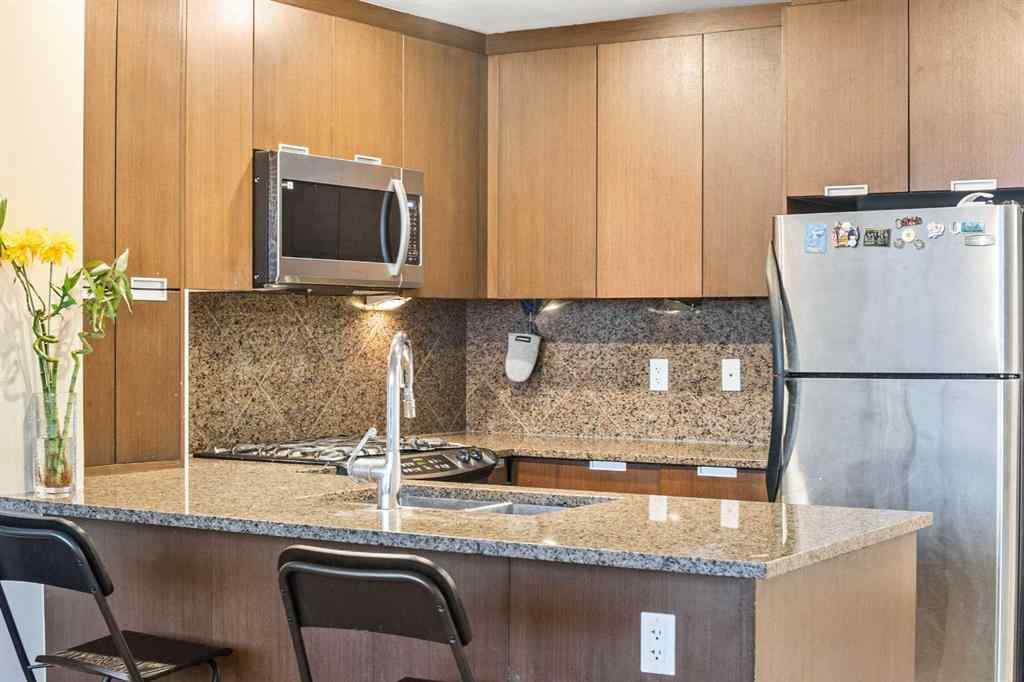 MLS® A2259859 - Unit #1403 99 Spruce Place SW in Spruce Cliff Calgary, Residential