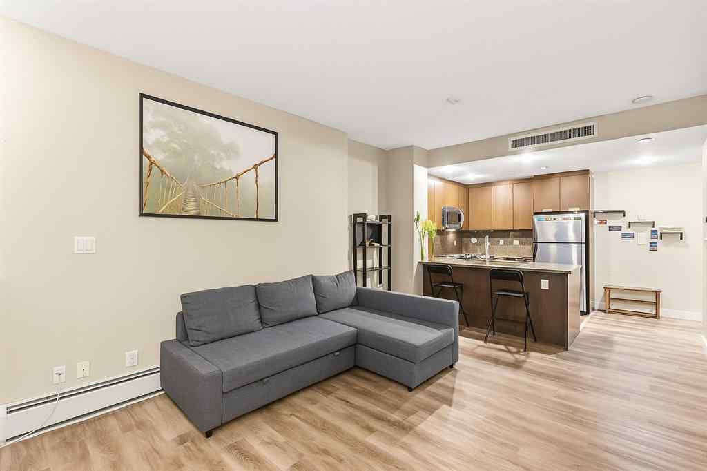 MLS® A2259859 - Unit #1403 99 Spruce Place SW in Spruce Cliff Calgary, Residential