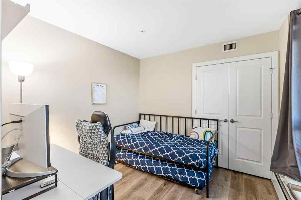 MLS® A2259859 - Unit #1403 99 Spruce Place SW in Spruce Cliff Calgary, Residential