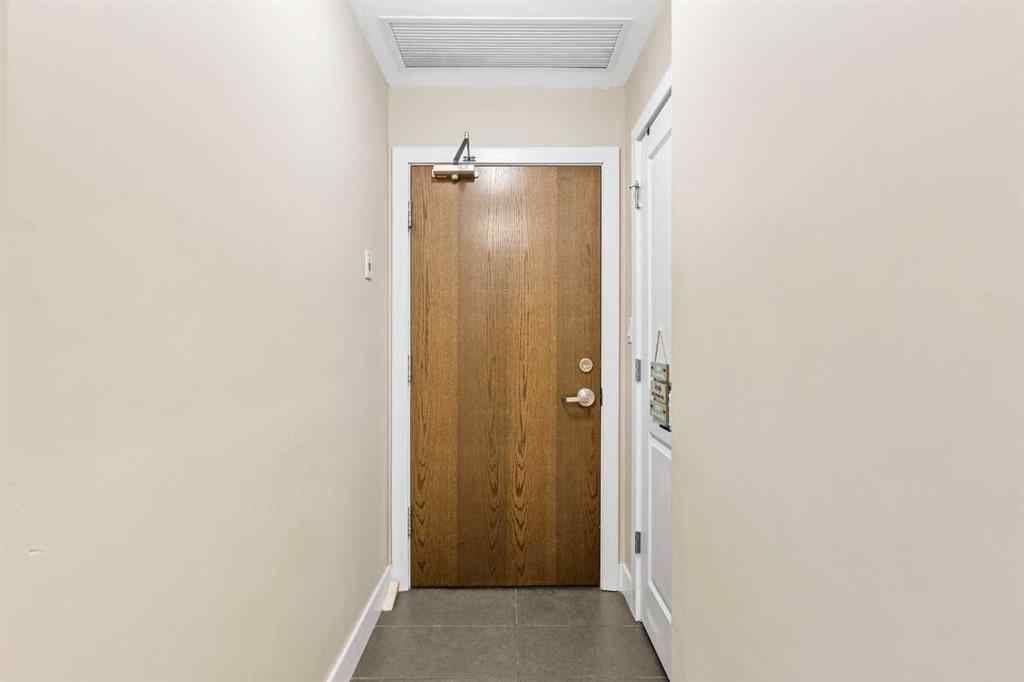 MLS® A2259859 - Unit #1403 99 Spruce Place SW in Spruce Cliff Calgary, Residential