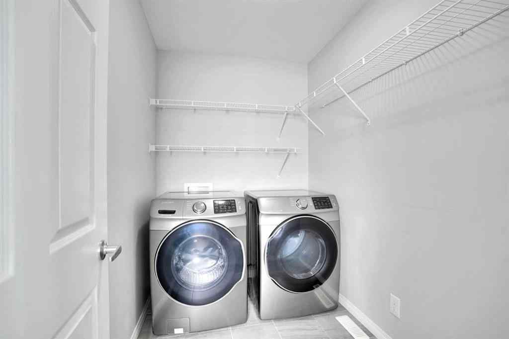 MLS® A2259894 - 64 Carrington Crescent NW in Carrington Calgary, Residential