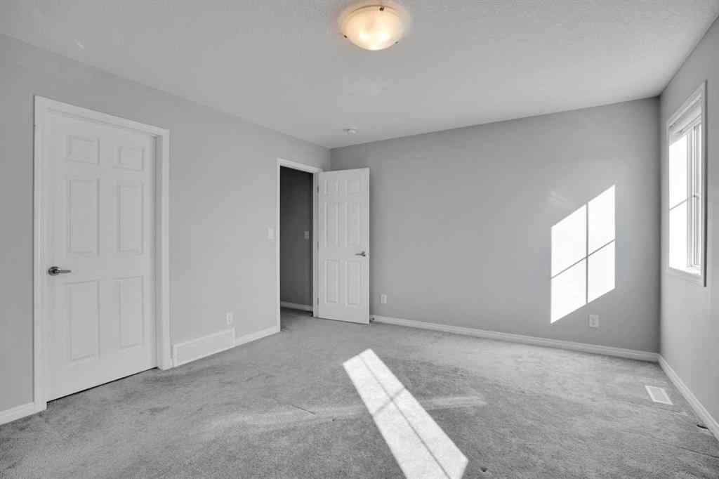 MLS® A2259894 - 64 Carrington Crescent NW in Carrington Calgary, Residential