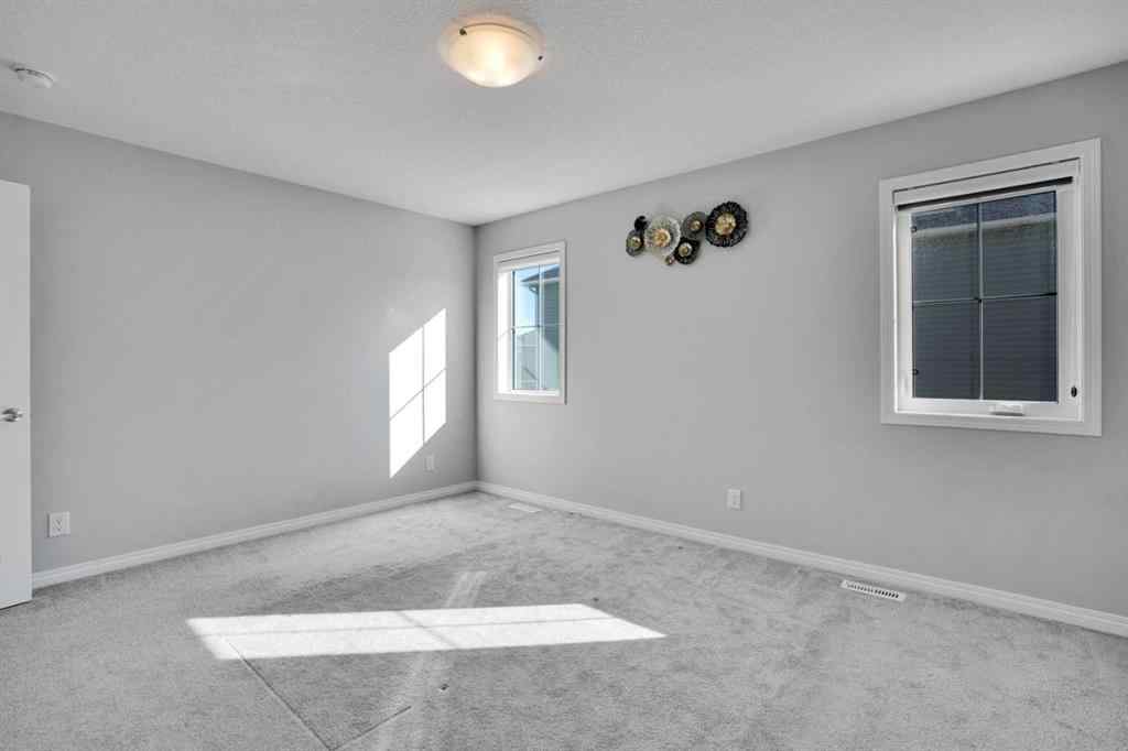 MLS® A2259894 - 64 Carrington Crescent NW in Carrington Calgary, Residential
