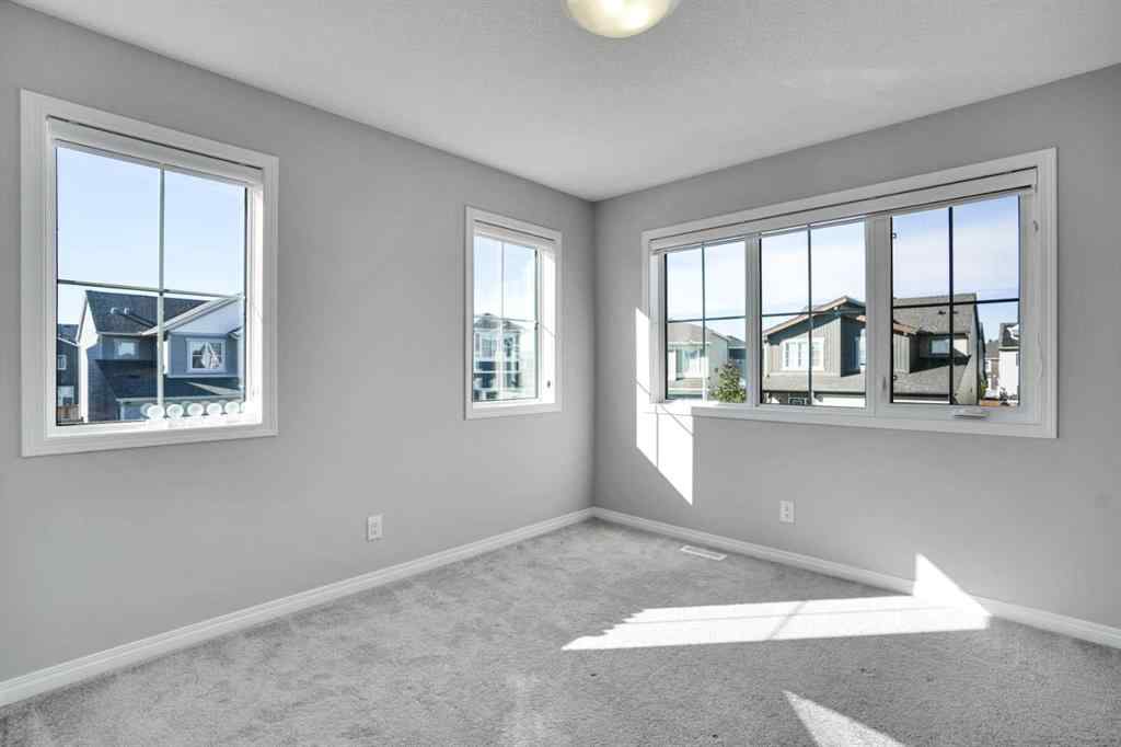 MLS® A2259894 - 64 Carrington Crescent NW in Carrington Calgary, Residential