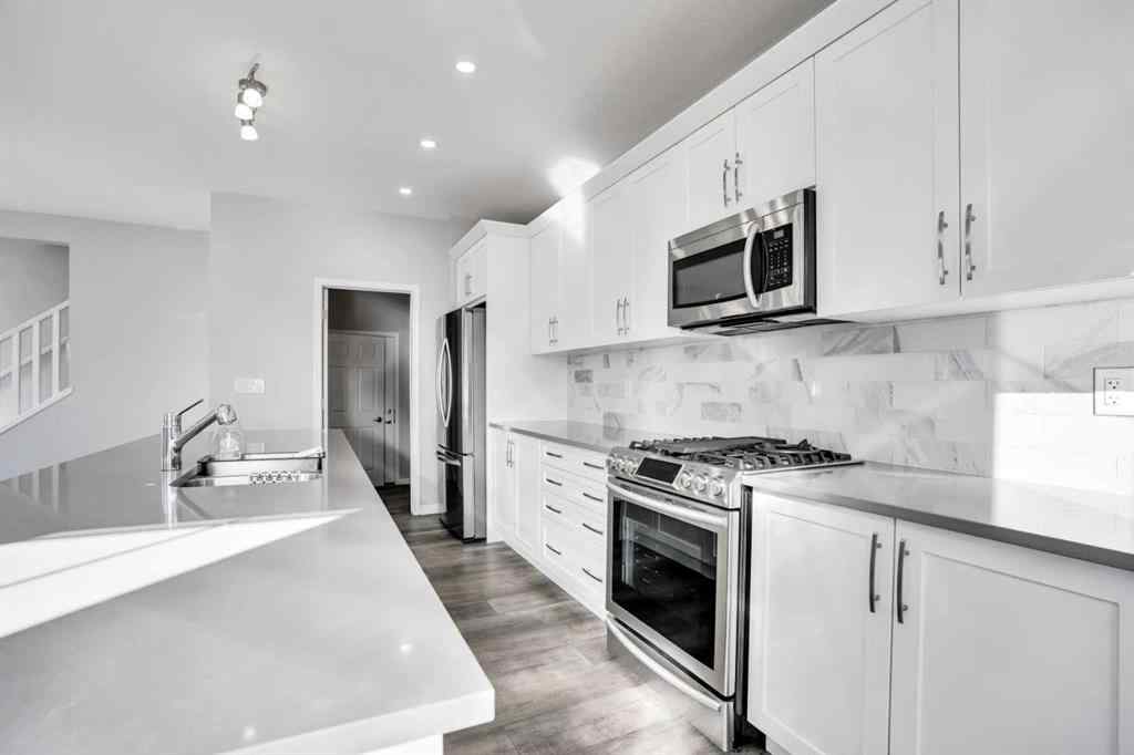 MLS® A2259894 - 64 Carrington Crescent NW in Carrington Calgary, Residential