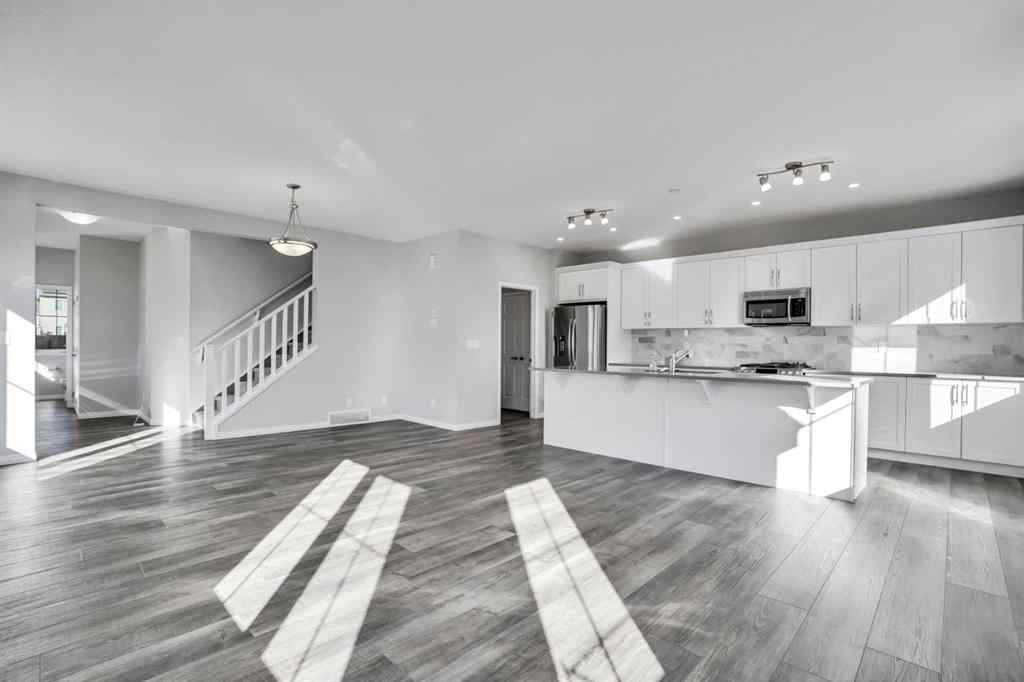MLS® A2259894 - 64 Carrington Crescent NW in Carrington Calgary, Residential