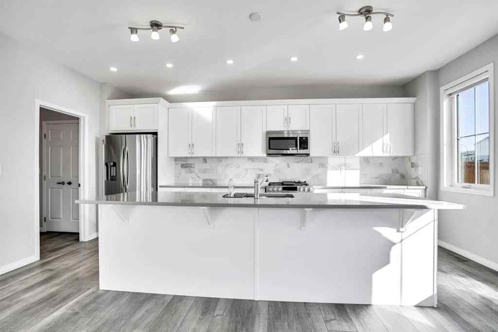 MLS® A2259894 - 64 Carrington Crescent NW in Carrington Calgary, Residential